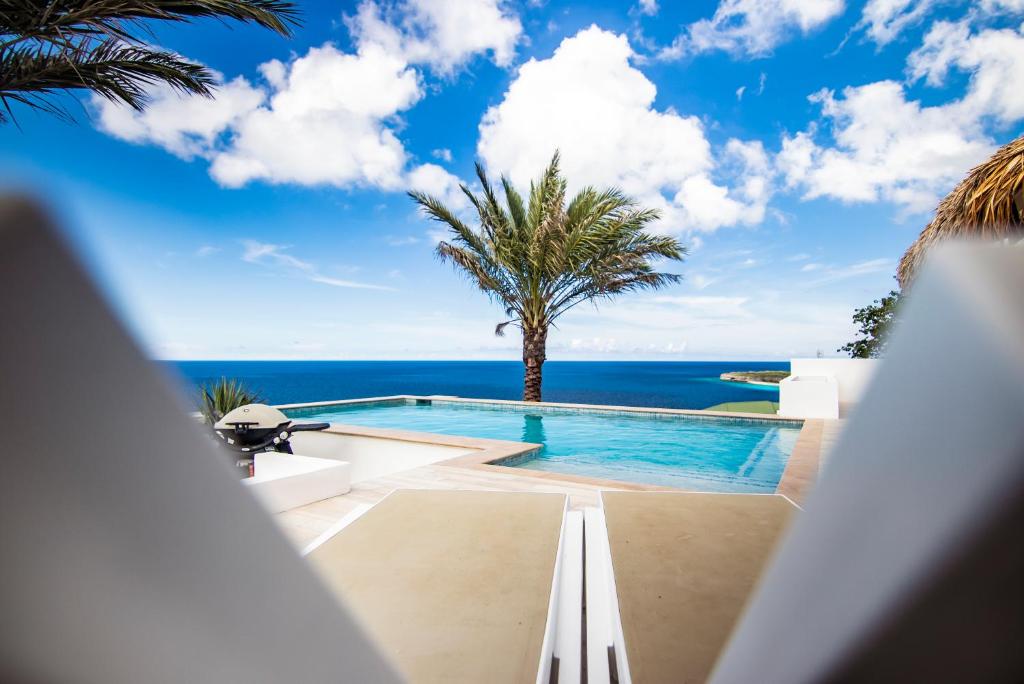 Exclusive 10-Person Seaview Villa in Cas Abou with Private Beach and Pool Bar photo 4