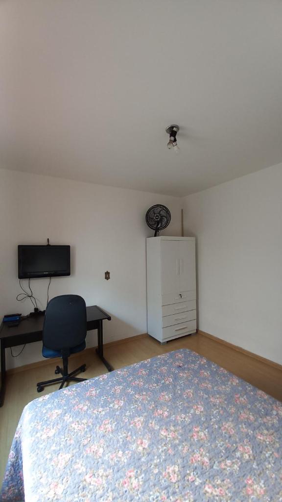 Quarto Aconchegante com banheiro compartilhado photo 2