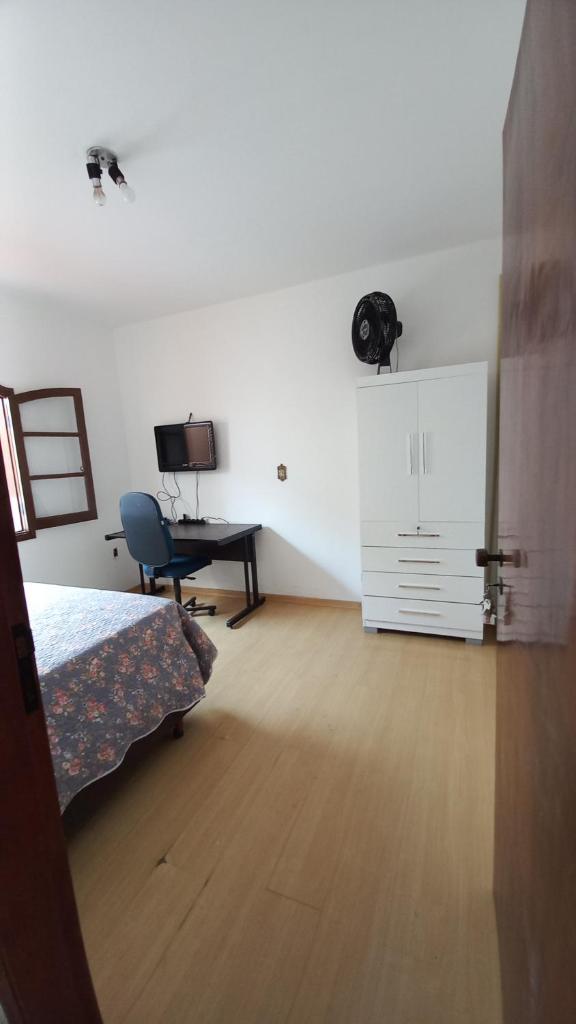 Quarto Aconchegante com banheiro compartilhado photo 3