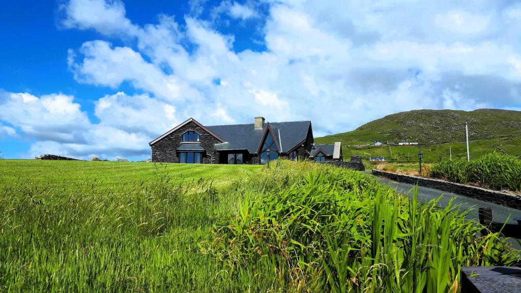 Fuchsia Lodge - New Luxury 5* Beachside Lodge with Sauna - 4 beds ensuite - Spectacular Location photo 1
