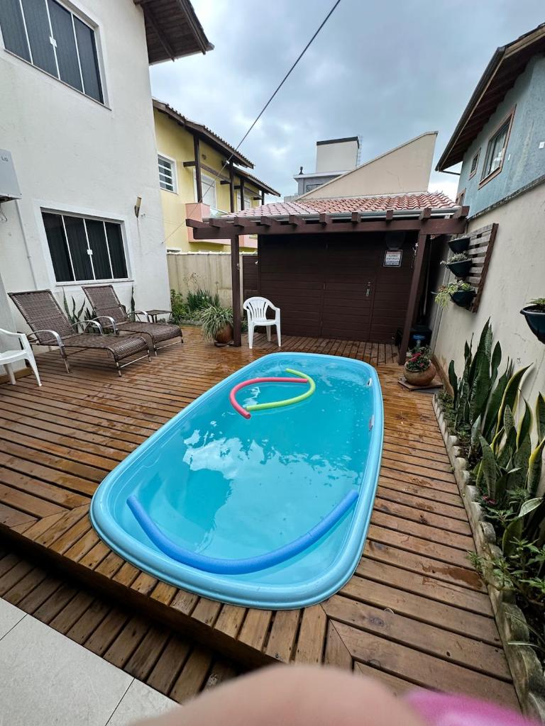Casa com piscina-4 quartos e 4 banheiros photo 2