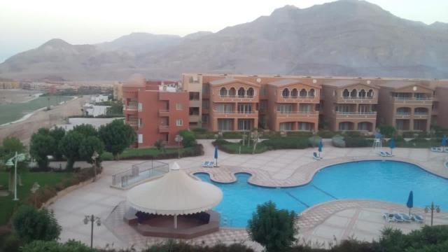 Chalet Porto El Sokhna Panorama area -2 bedroom- excellent view شاليه ببورتو السخنة - منطقة البانوراما غرفتين وريسبشن فيو البسين والجولف والبحر- Family only photo 4