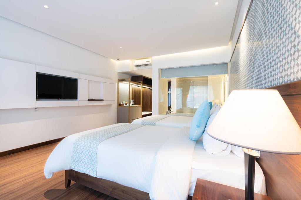 Hoang Ngoc Beach Resort Room Type - Deluxe Twin Room with Garden View