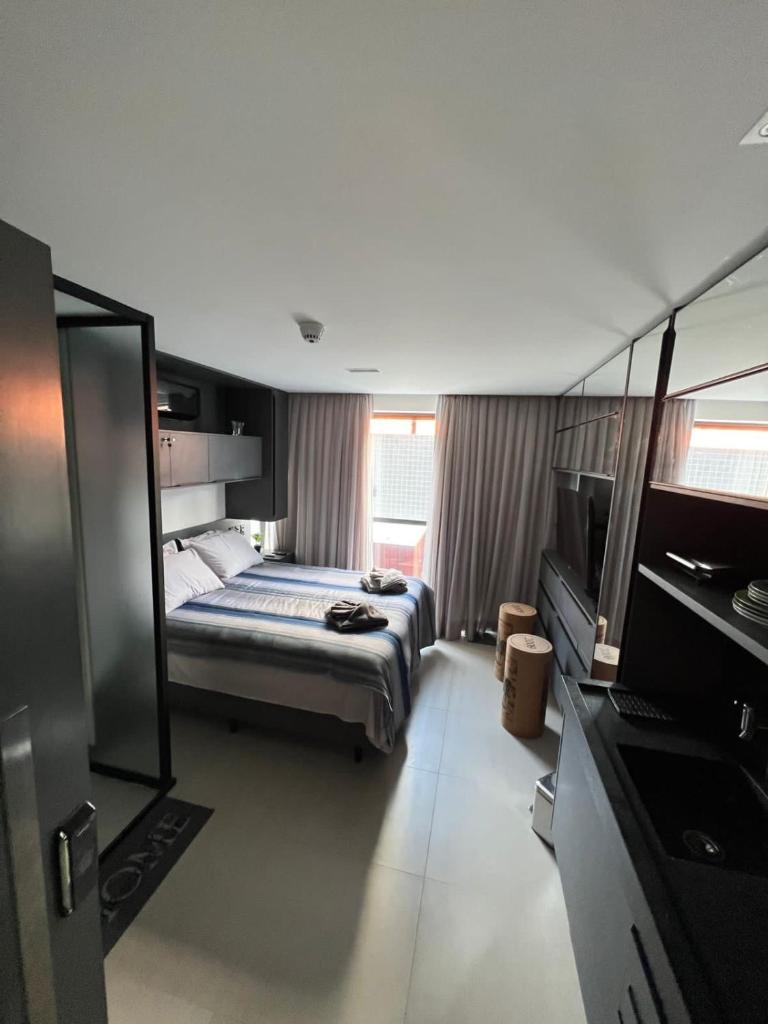 Flat completo - Até 2 Pessoas - Unidade com Jacuzzi privativa e área comum com visão para o mar photo 3