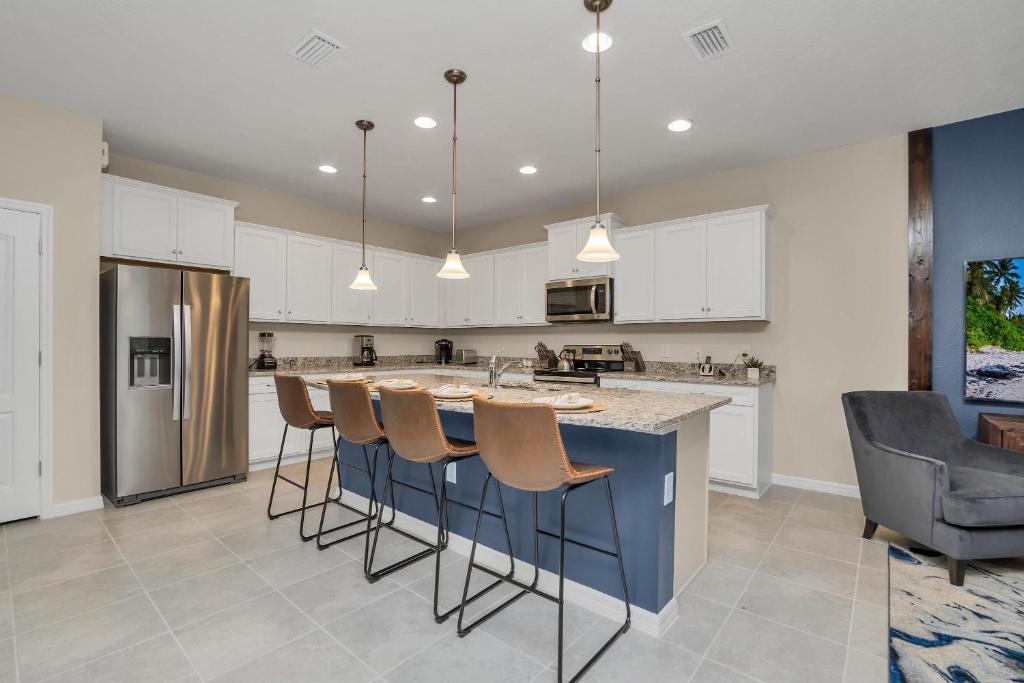 BSV8856 - 10 Bed 6 Bath Villa in Windsor at Westside with FREE POOL HEAT photo 1