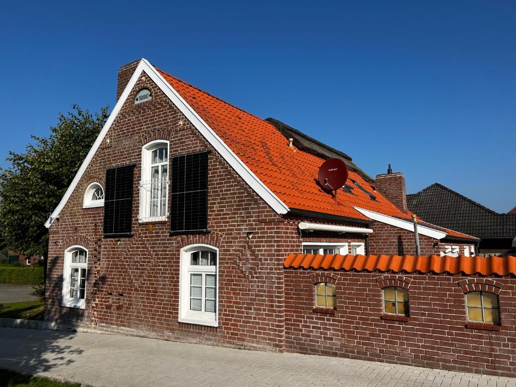 Lindenhuus-Urlaub unter einem Teilreetdach-Terrasse - Nahe Norden-Norddeich photo 4