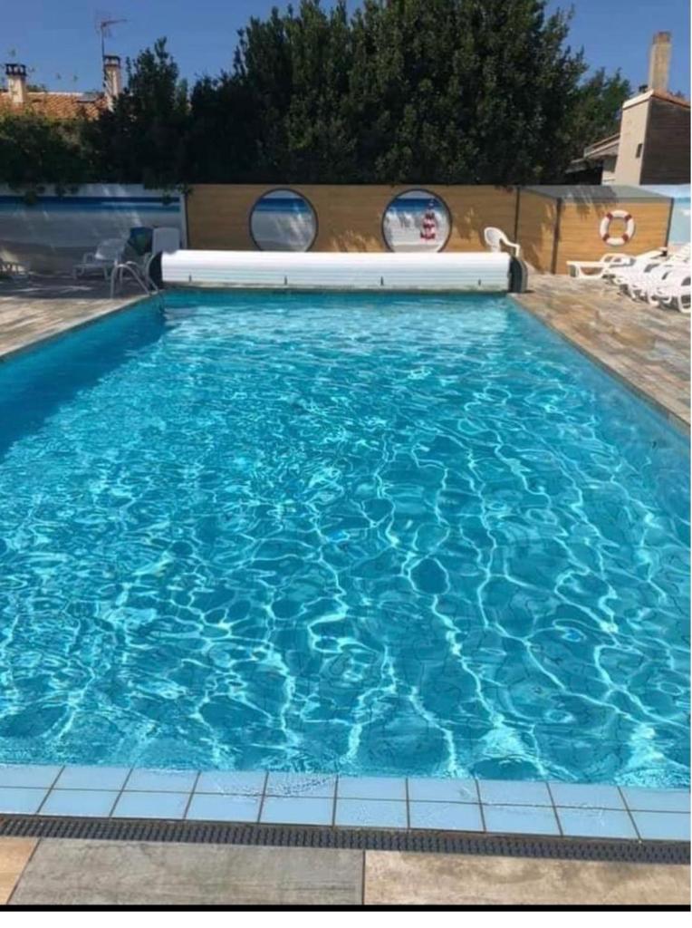 Camping à la Cotinière-Piscine-Bungalow cosy entre Océan et Pinède photo 1
