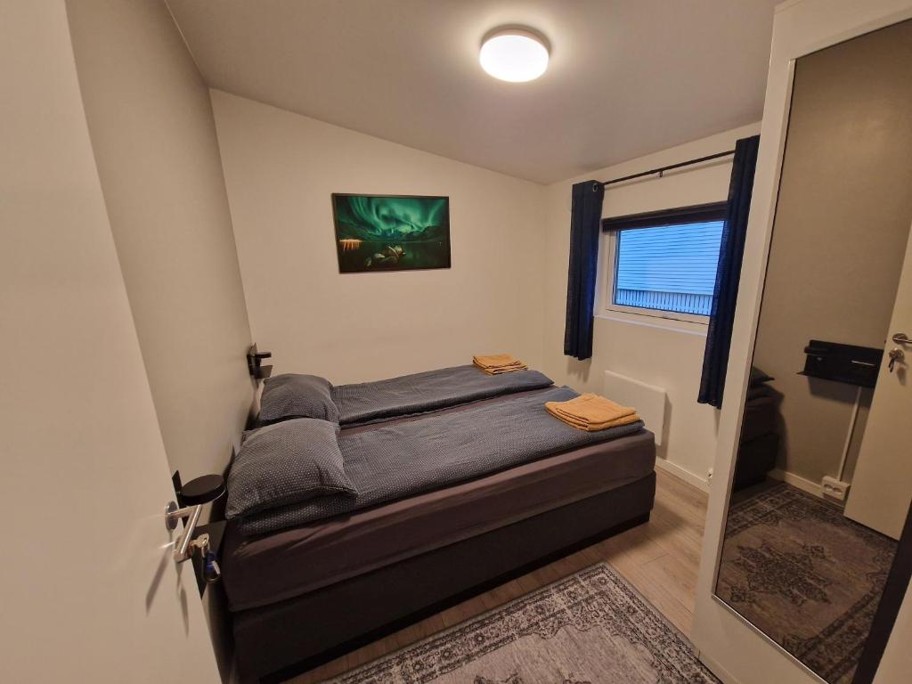 Northern living 2 room with shared bathroom - Tap to explore photos