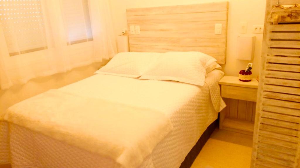 Petite Suite Juquehy - A 2 quadras do Mar - Pequena mas completa - Ar condicionado - Frigobar -TV smart tela plana - Serviço de Praia - Roupa de cama e banho luxo - Zero mofo - Wi Fi - Tudo novo ! photo 1