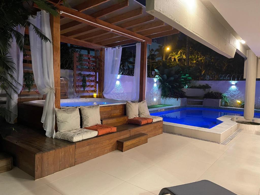 Vila linda com SPA e Piscina a 50 metros da Praia photo 3