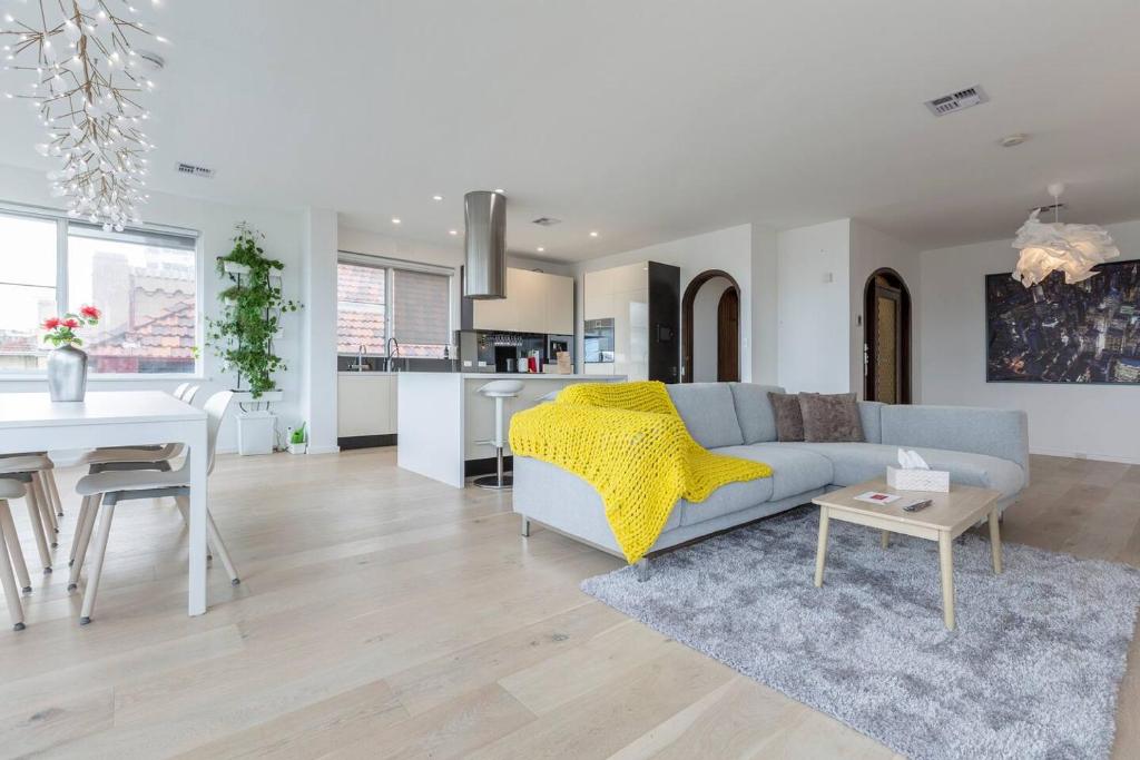Modern Meets Convenience in this Beachfront Oasis photo 1