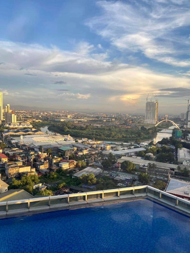 Classy 2BR Suite at Eastwood City with Pool and City Skyline View photo 1