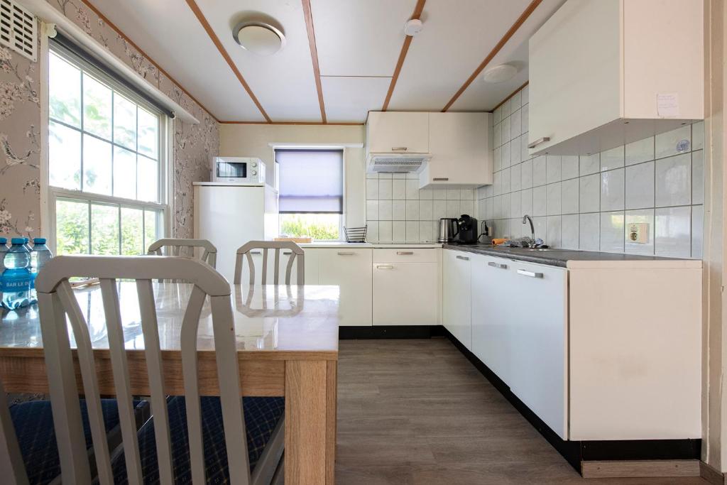 26, gelegen in het bosrijke Oisterwijk met privé tuin! photo 2