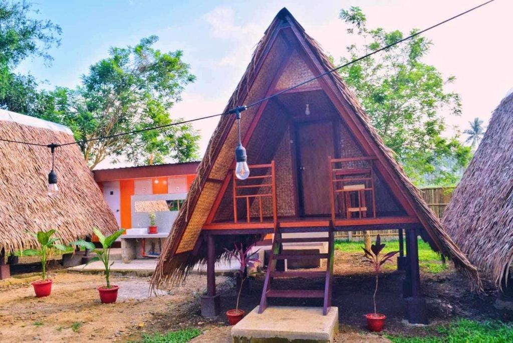 HIRAYA Camp Site - FREE use of SCOOTER for NIPA HUTS