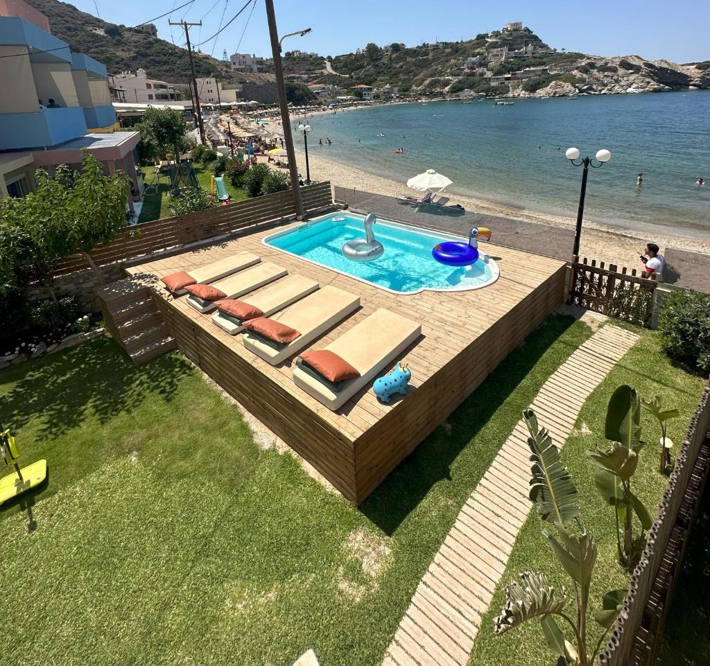 Beach front apartment with swimming pool photo 1