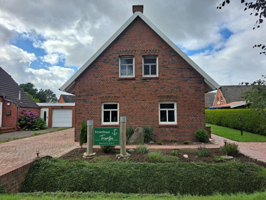 Tolles Ferienhaus in Pilsum - Ferienhaus Trientje - mit Garten und überdachter Terrasse photo 4