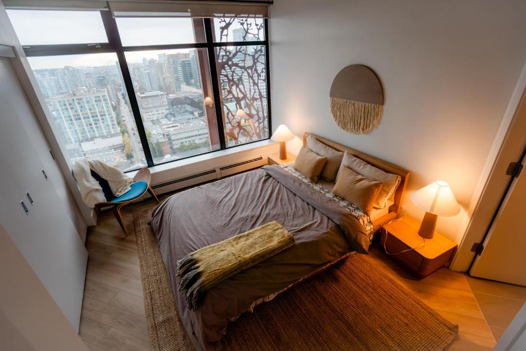 34th-Floor Gastown 2BR with Parking & Harbour Views - Tap to explore photos