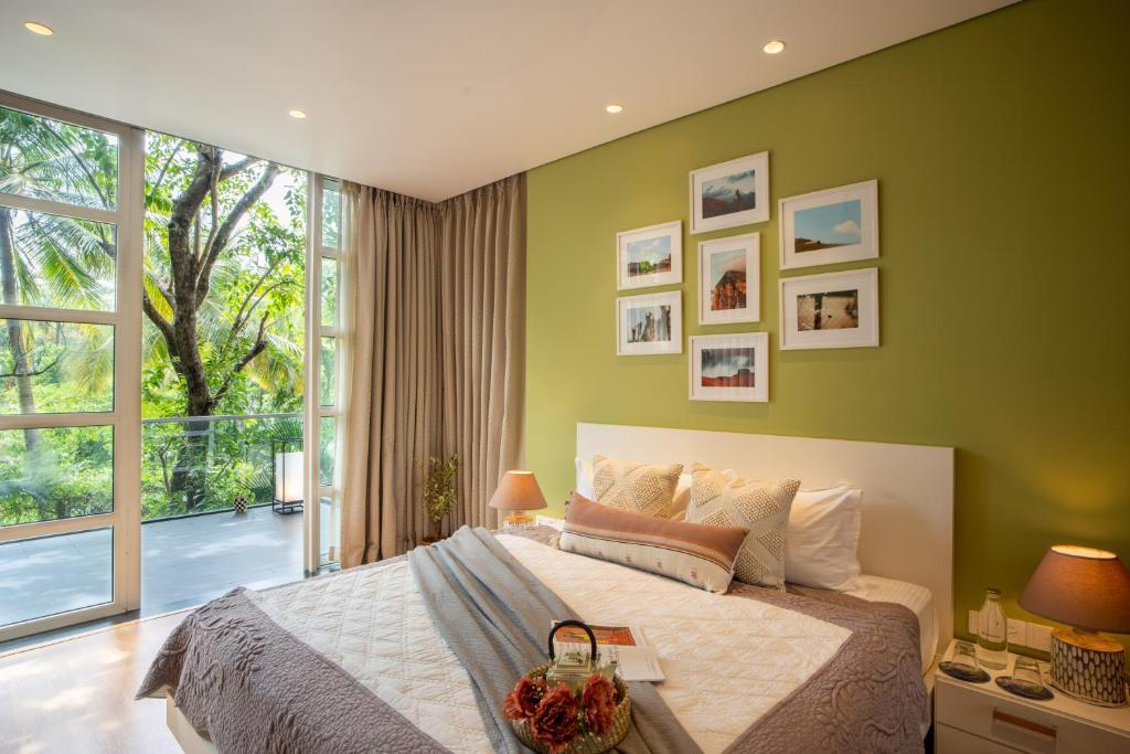 Elivaas Dahlia Luxe 4BHK Villa with Pvt Pool near Baga photo 1