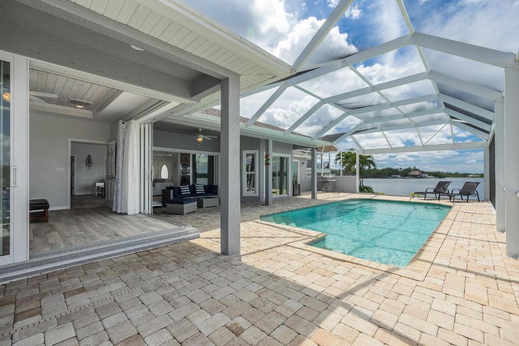 Heaven Found! Stunning River Views & Pool - Villa Island Sunset - Roelens Vacations photo 1