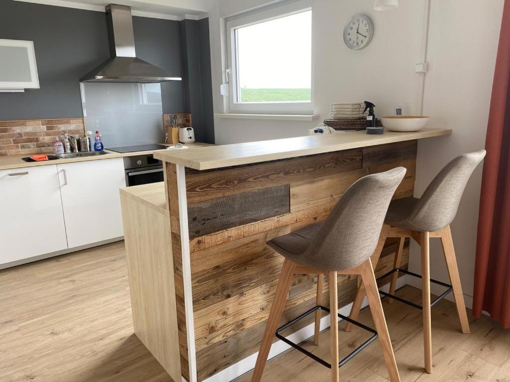 Lina's Ferienwohnungen - zwei moderne FeWos mit Sauna im Haus und fantastischem Ausblick photo 1