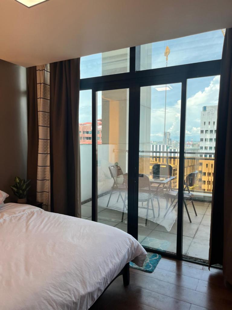 Appleone Ayala Condo with Balcony - Tap to explore photos