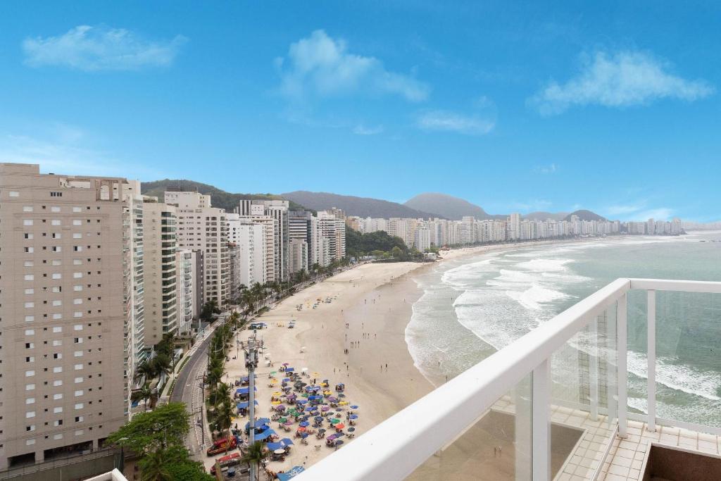 Triplex pé na areia com vista p/ praia no Guarujá