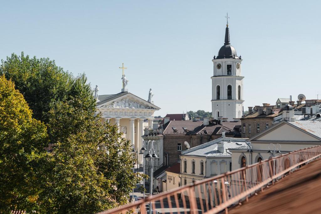 CATHEDRAL Old Town Suites - Tap to explore photos