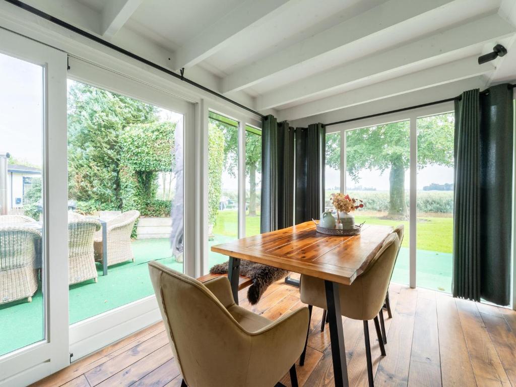 Fantastic Chalet near open water and with open views and terras photo 2