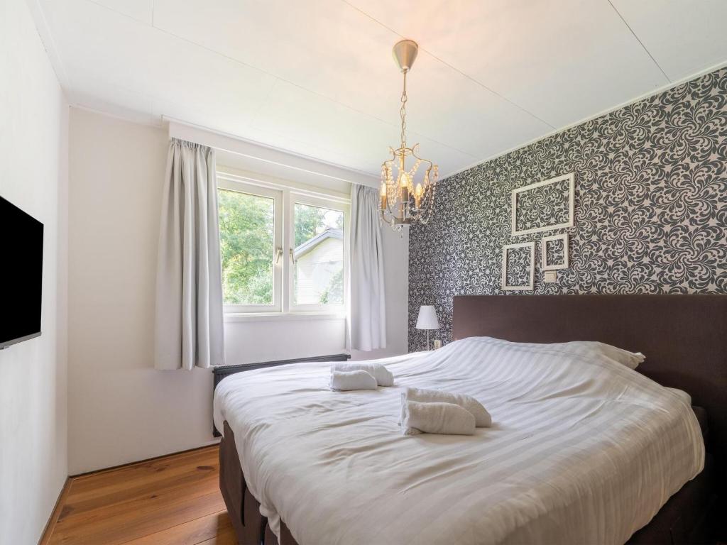 Fantastic Chalet near open water and with open views and terras photo 3