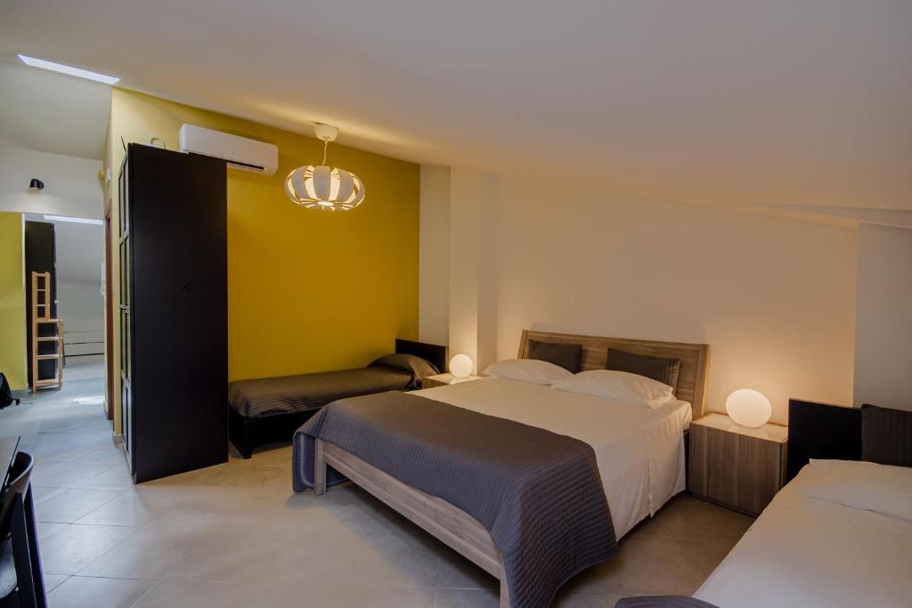 La Scivola Rooms - Tap to explore photos