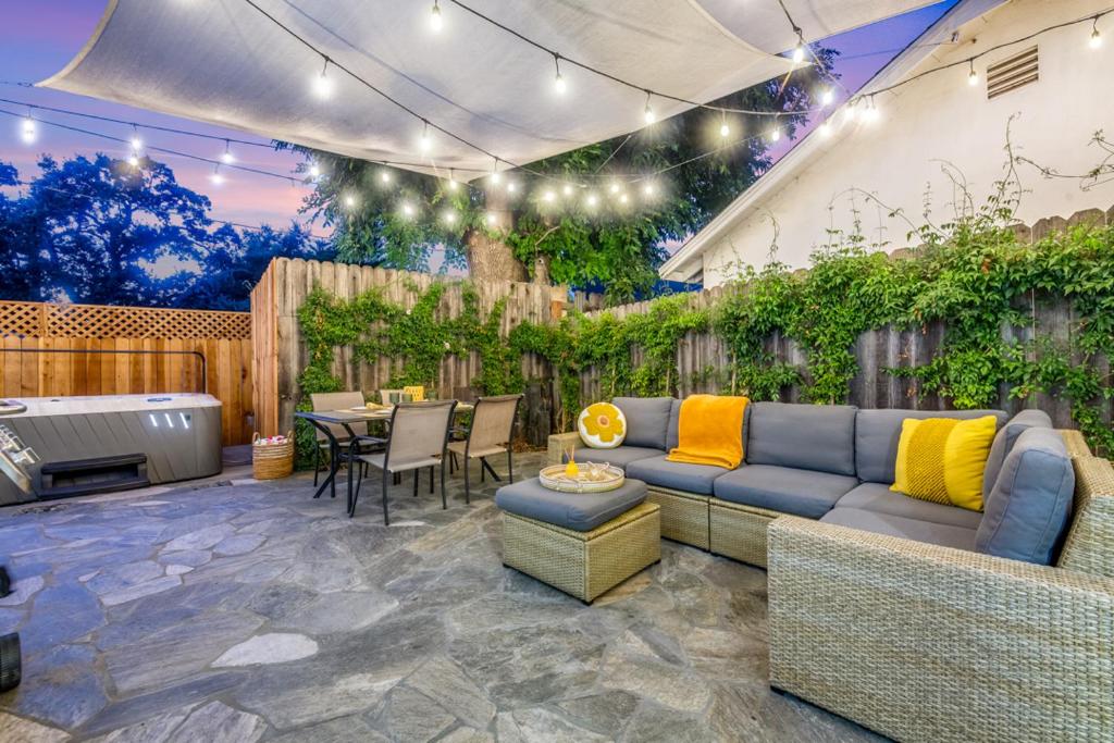 Modern Cottage, Hot Tub, Bistro Patio, Putting Green, Walk to All! image