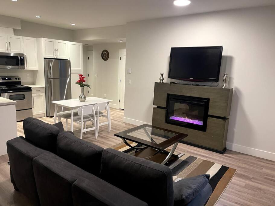 2 Bedroom Basement Suite With Kitchen and Laundry - Tap to explore photos
