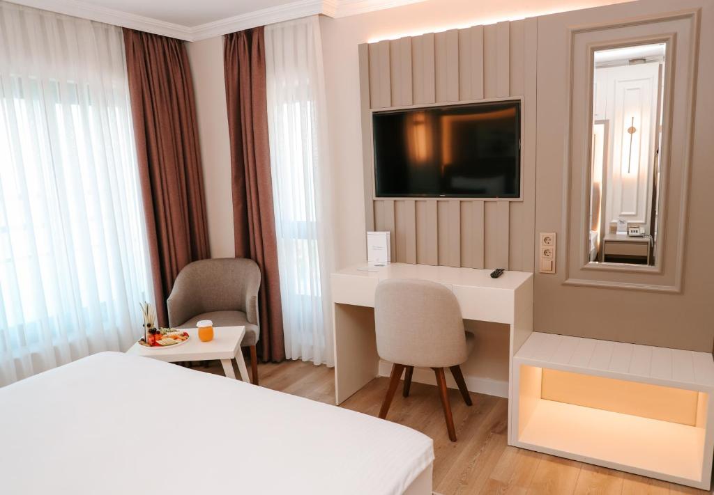 Vira Otel Suites - Tap to explore photos