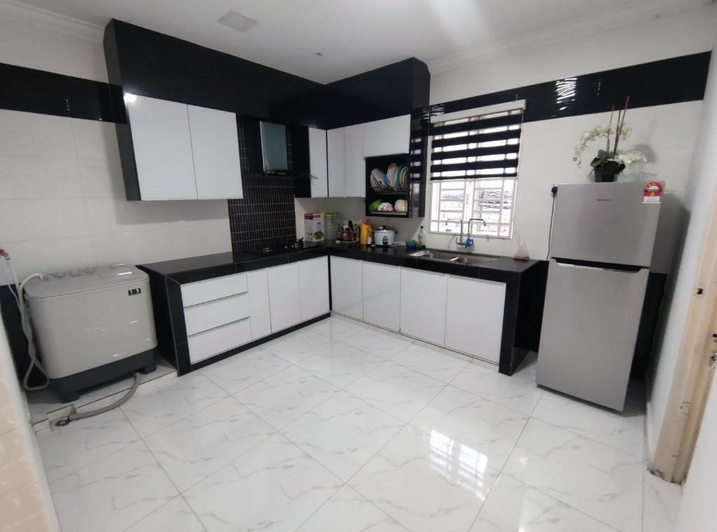 HOMESTAY RIZQI TRIANG photo 4