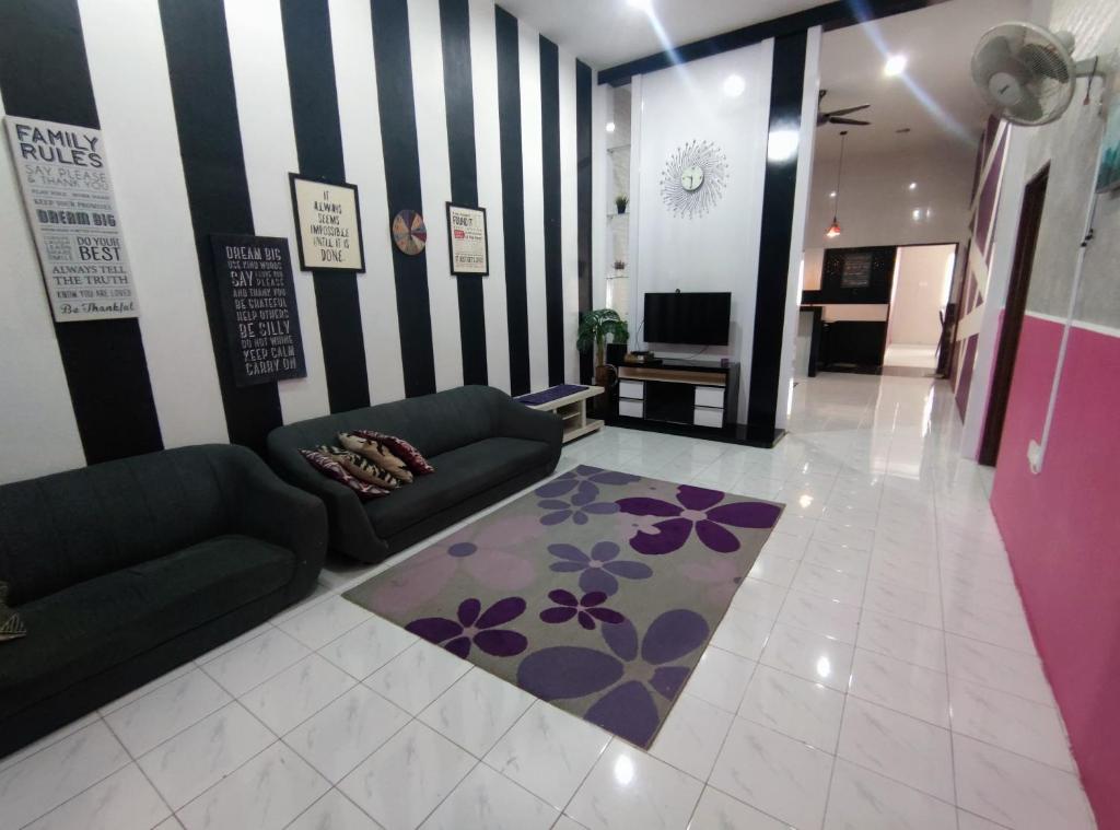 HOMESTAY RIZQI TRIANG