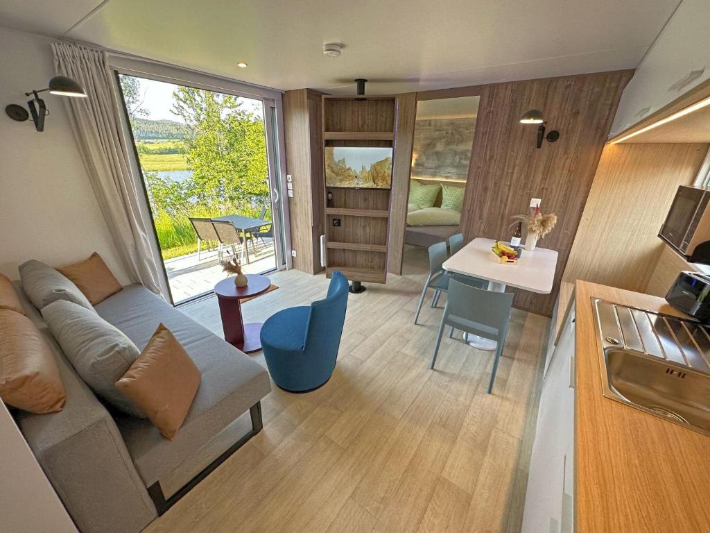 Tiny house with terrace and lake view photo 3