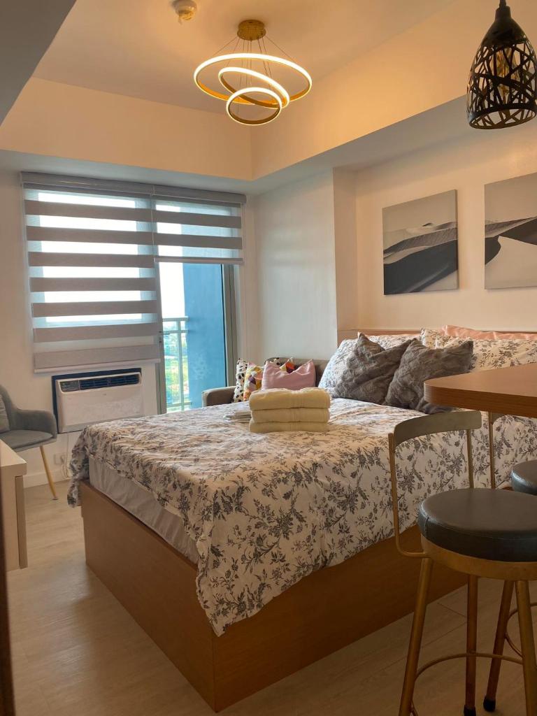 LeisureStay Studio @ Azure North - Tap to explore photos