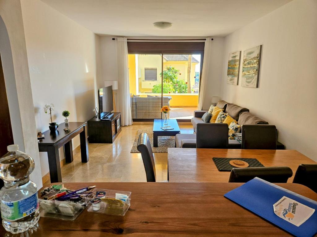 Ground floor 2 bed apartment with 5 pools and large terrace