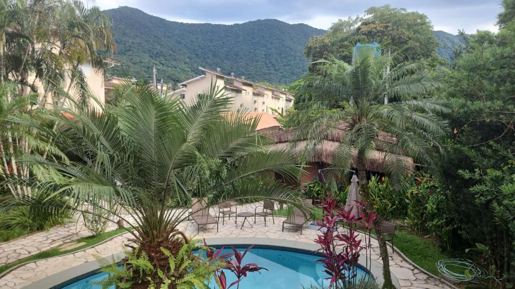 Condominio Pousada North Shore Maresias Studios p 2 3 e 4 pessoas 1 quadra da praia mini cozinha completa tv ar cond wifi estacionamento photo 1