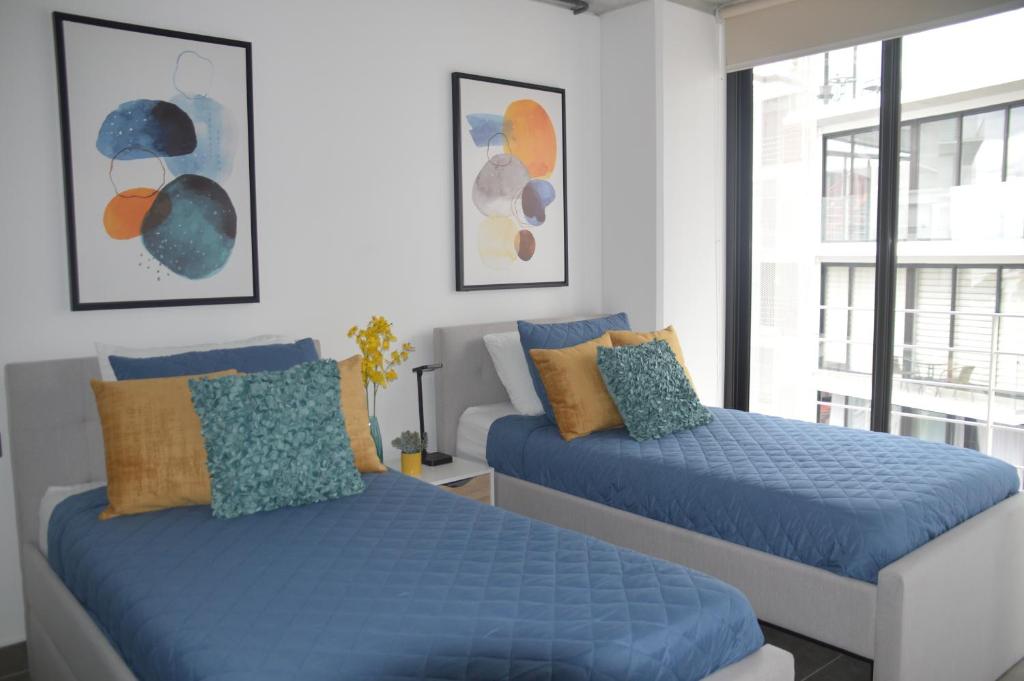 Cozy Stays Cayala Apartments (401) photo 1