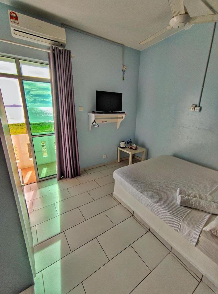 AQIL BEACH INN photo 1
