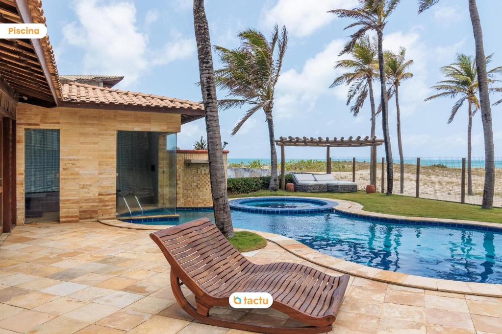 Casa de praia luxuosa do Porto das Dunas por Tactu photo 4