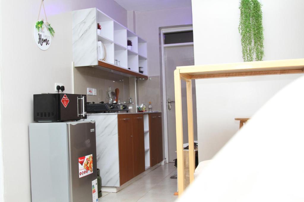 Artsy Urban 1Br along Kiambu Road with a pool and scenic views photo 1