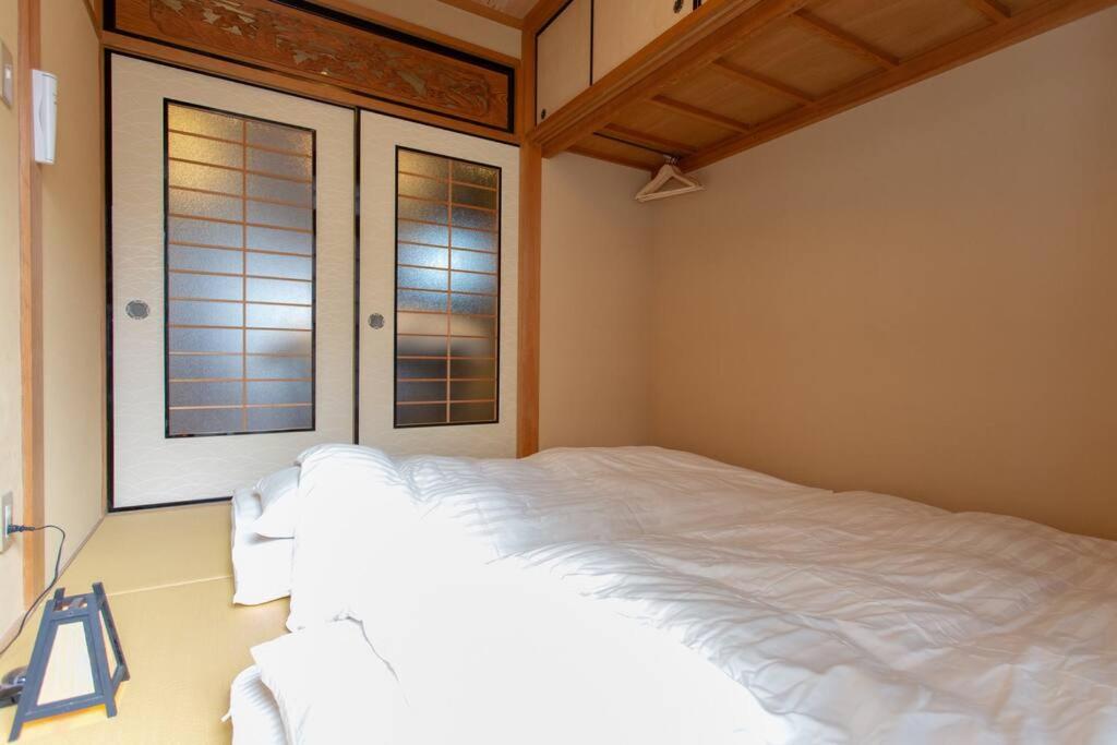 Kanmuritei Guest House UP to 7 pax, 冠邸l和モダン最大7名まで宿泊可能 photo 1