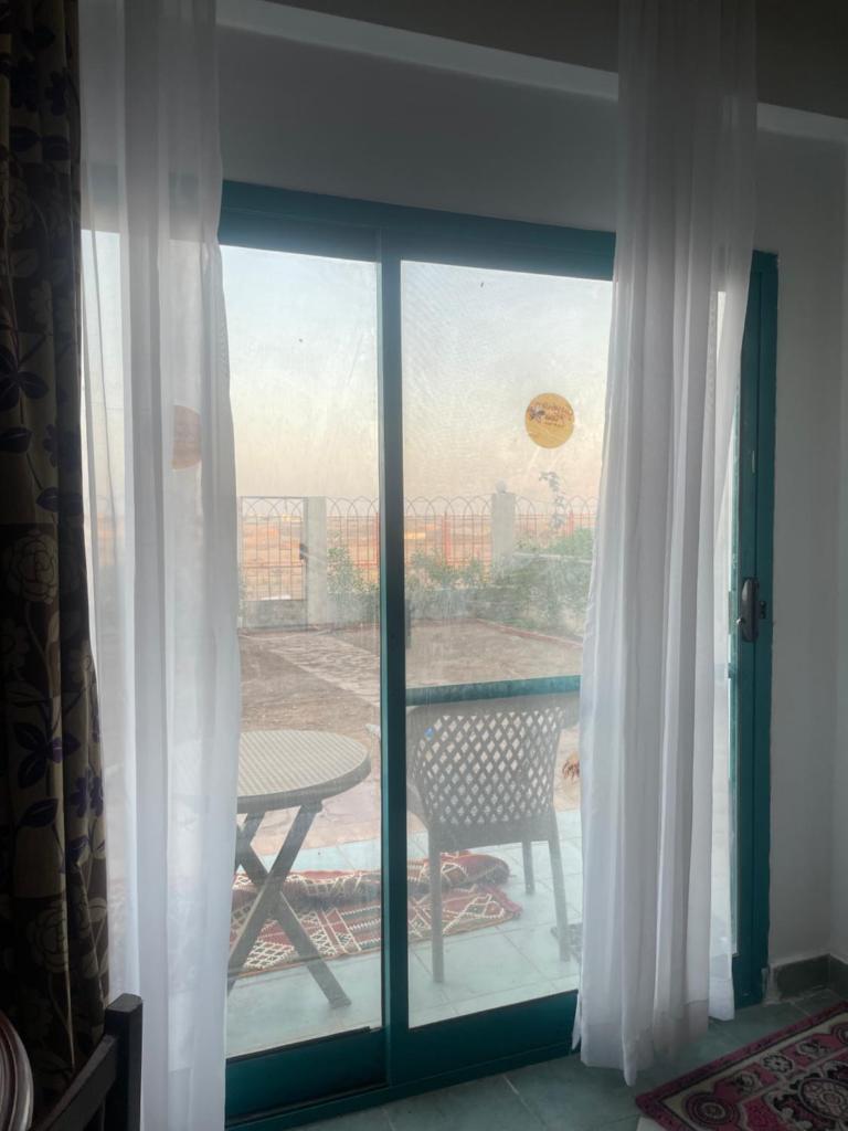 A cozy room in 2 bedrooms apartment with a back yard photo 1
