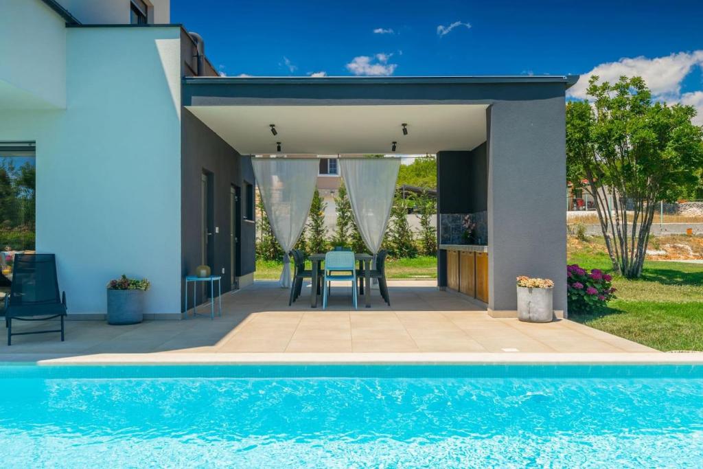 Luxury villa Hedone with pool in Rakalj photo 1