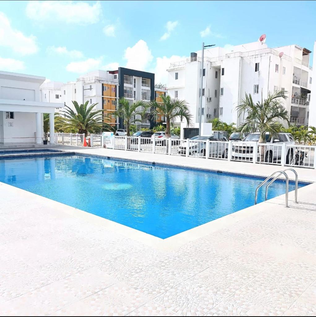 Hermoso residencial con piscina licey al medio photo 4