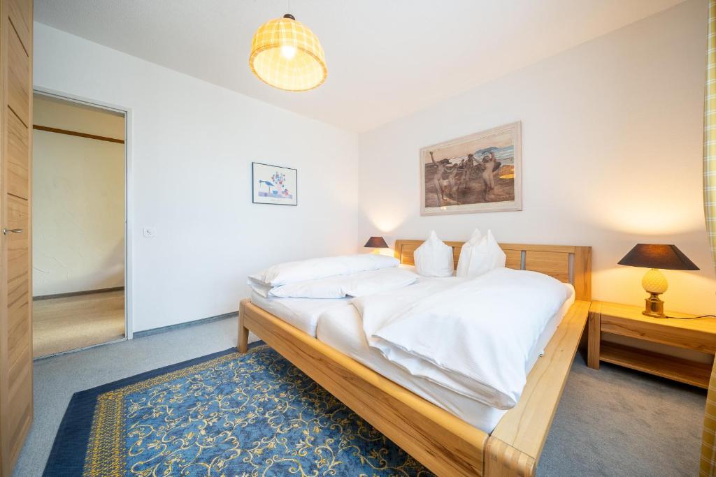 8001 Gemuetliche 2,5-Zimmer-Wohnung mit wunderschoenem Ausblick Richtung Scuol photo 3