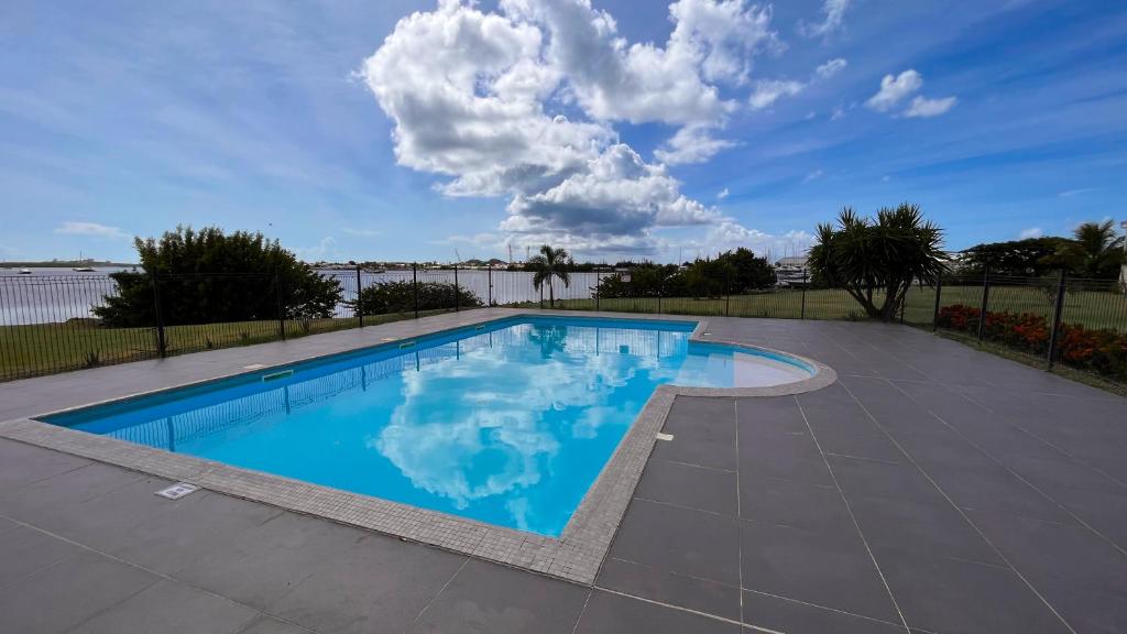 Le Baileys - Spacieux appartement en rez-de-jardin vue lagon photo 1