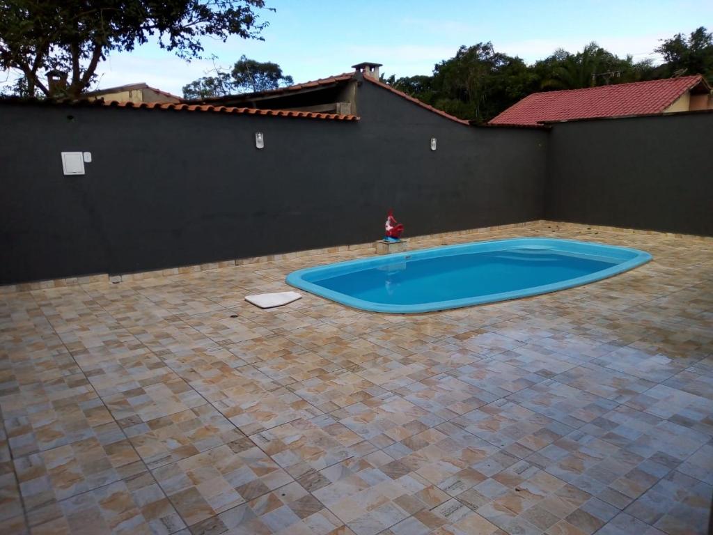Casa com piscina em condomínio fechado photo 2